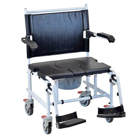 Elderly person using daily living aids at home